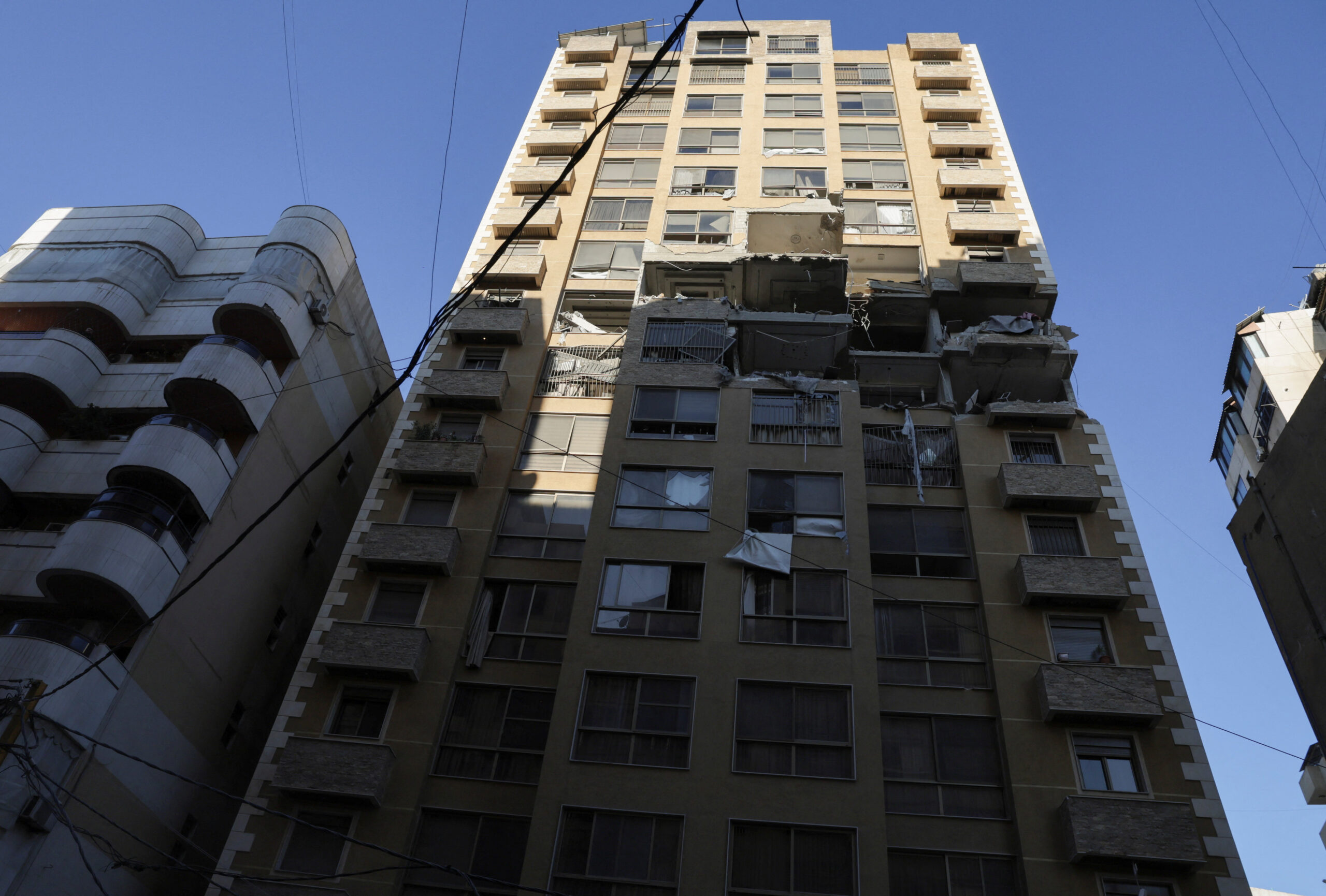 Aftermath of an Israeli strike, in central Beirut A damaged apartment building in the aftermath of an Israeli strike, in central Beirut, Lebanon, March 11, 2026, following an escalation between Hezbollah and Israel amid the U.S.-Israeli conflict with Iran. REUTERS/Emilie Madi