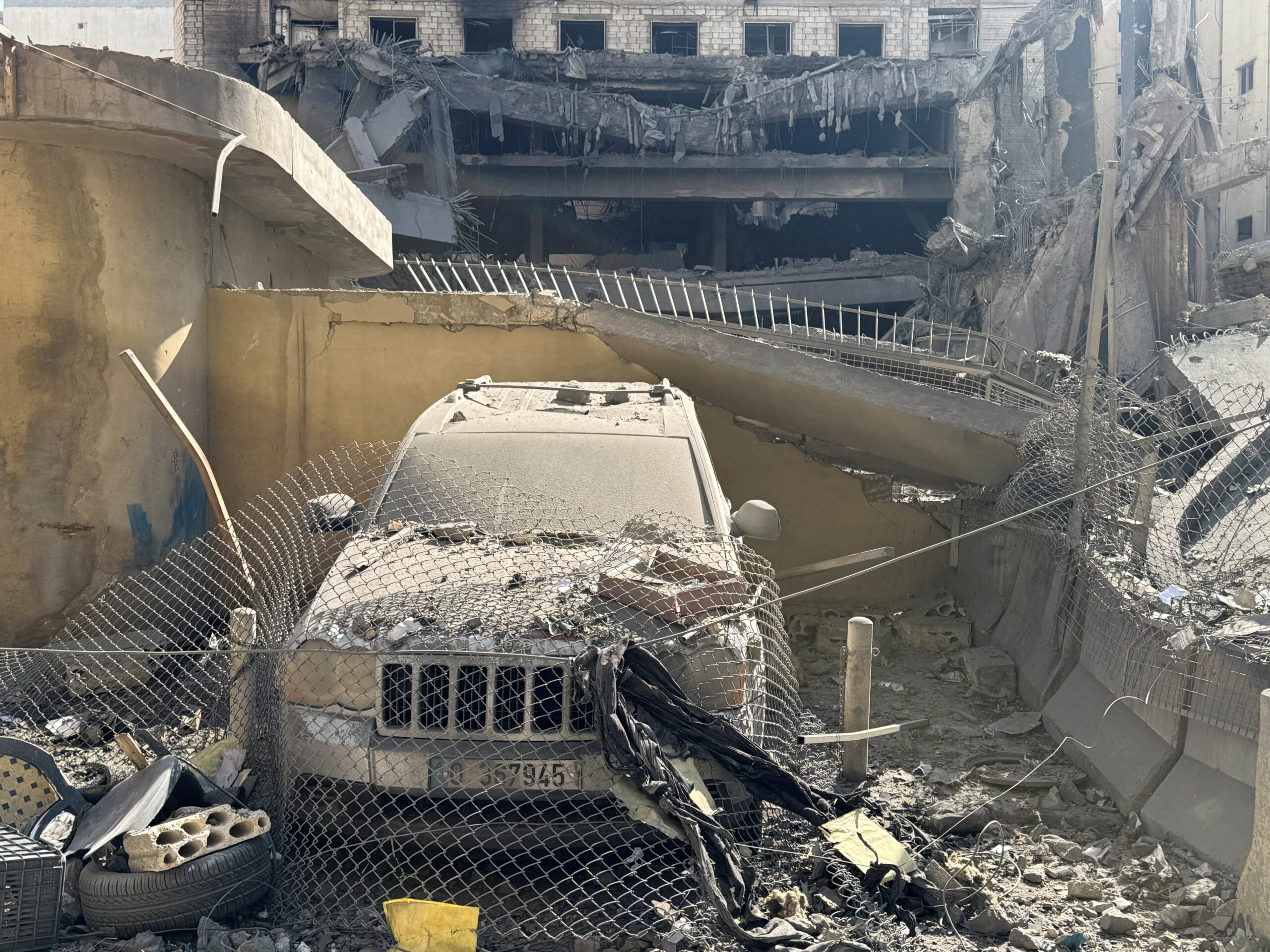 Escalation between Hezbollah and Israel, amid the U.S.-Israeli conflict with Iran, in Beirut Debris and a damaged vehicle at the site of an Israeli strike on Beirut's southern suburbs, following an escalation between Hezbollah and Israel amid the U.S.-Israeli conflict with Iran, Lebanon, March 3, 2026. Picture taken with a mobile phone. REUTERS/Ahmed Al Kerdi