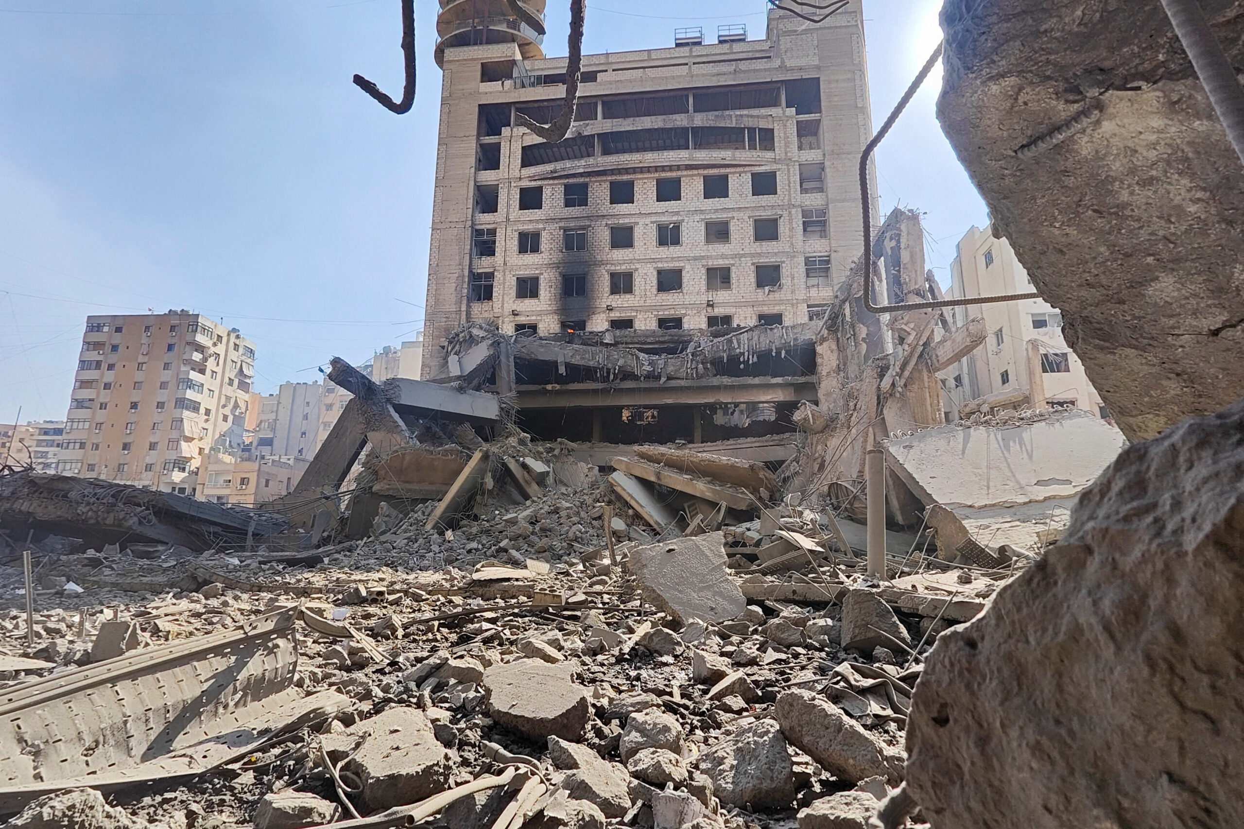 Escalation between Hezbollah and Israel, amid the U.S.-Israeli conflict with Iran, in Beirut Debris at the site of an Israeli strike on a building that houses Al-Manar TV offices in Beirut's southern suburbs, following an escalation between Hezbollah and Israel amid the U.S.-Israeli conflict with Iran, Lebanon, March 3, 2026. Picture taken with a mobile phone. REUTERS/Stringer