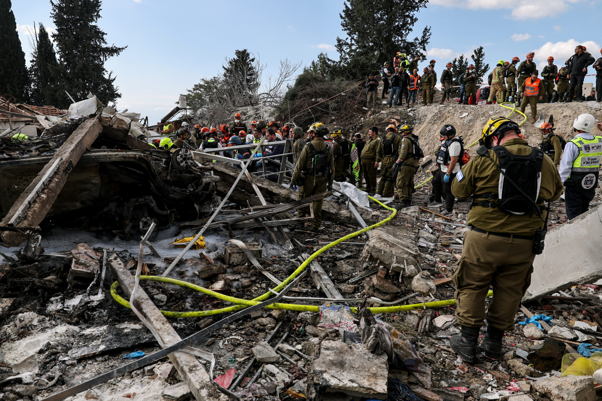 Aftermath of an Iranian strike in Beit Shemesh Emergency personnel work at the site of an Iranian strike, after Iran launched missile barrages following attacks by the U.S. and Israel on Saturday, in Beit Shemesh, Israel March 1, 2026. REUTERS/Ammar Awad