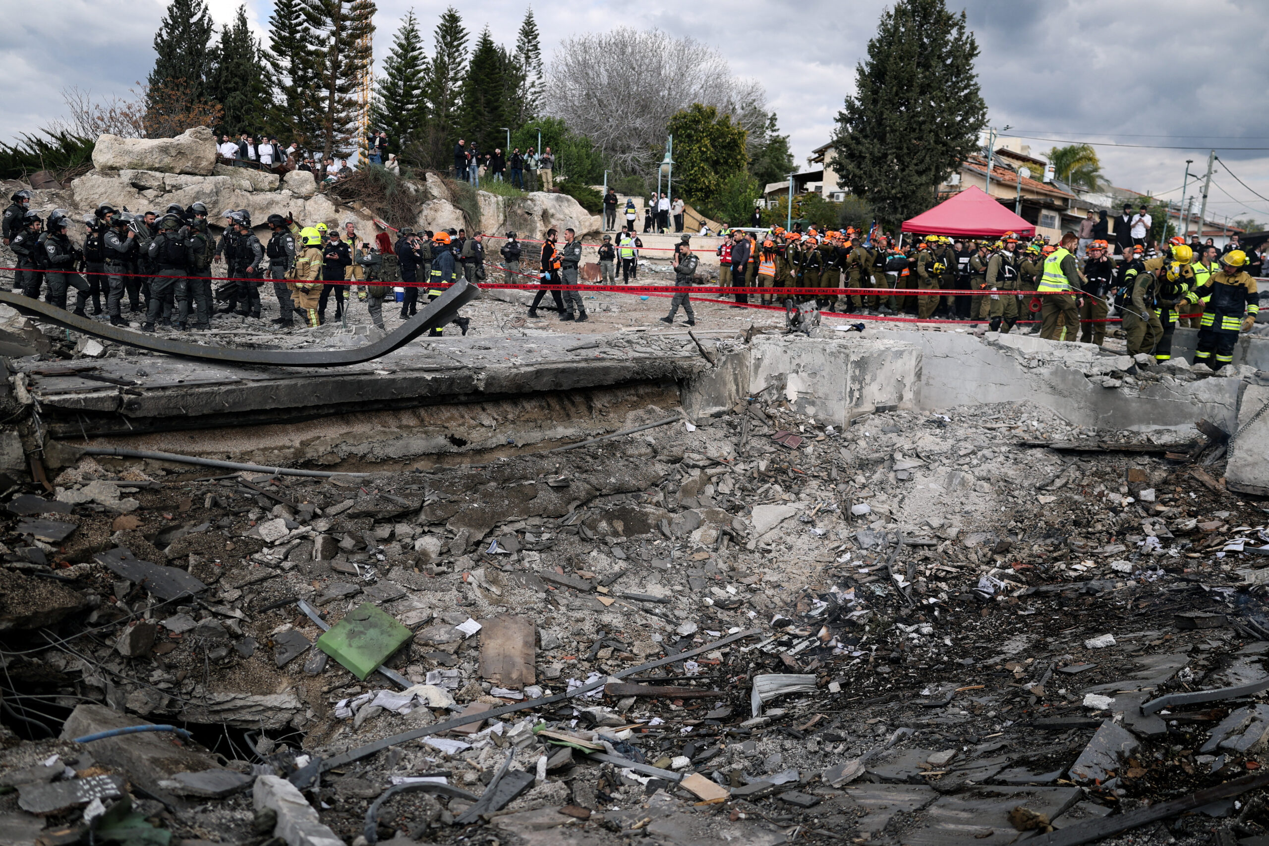 Aftermath of an Iranian strike in Beit Shemesh Emergency personnel work at the site of an Iranian strike, after Iran launched missile barrages following attacks by the U.S. and Israel on Saturday, in Beit Shemesh, Israel March 1, 2026. REUTERS/Ammar Awad