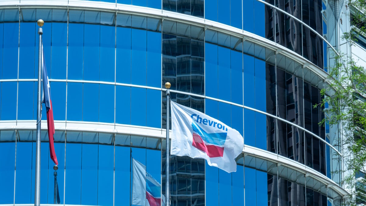 Houston, Texas, USA - April 4, 2024: The flags at Chevron Corporation office building in Houston, Texas, USA. Chevron Corporation is an American multinational energy corporation.