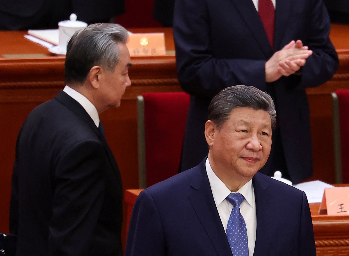 Chinese People’s Political Consultative Conference opens in Beijing Chinese Foreign Minister Wang Yi walks past Chinese President Xi Jinping during the opening session of the Chinese People's Political Consultative Conference (CPPCC), at the Great Hall of the People in Beijing, China March 4, 2026. REUTERS/Maxim Shemetov
