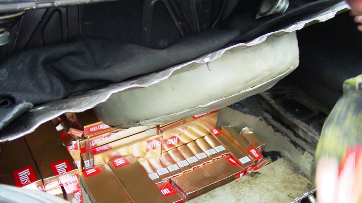 A car boot stuffed full of cigatette cartons and boxes - This is the real thing from KFOR, Kosovo 1999. This image is part of our historic collection. The digital cameras avilible back then where very bad, so expect exceptionally bad image quality.