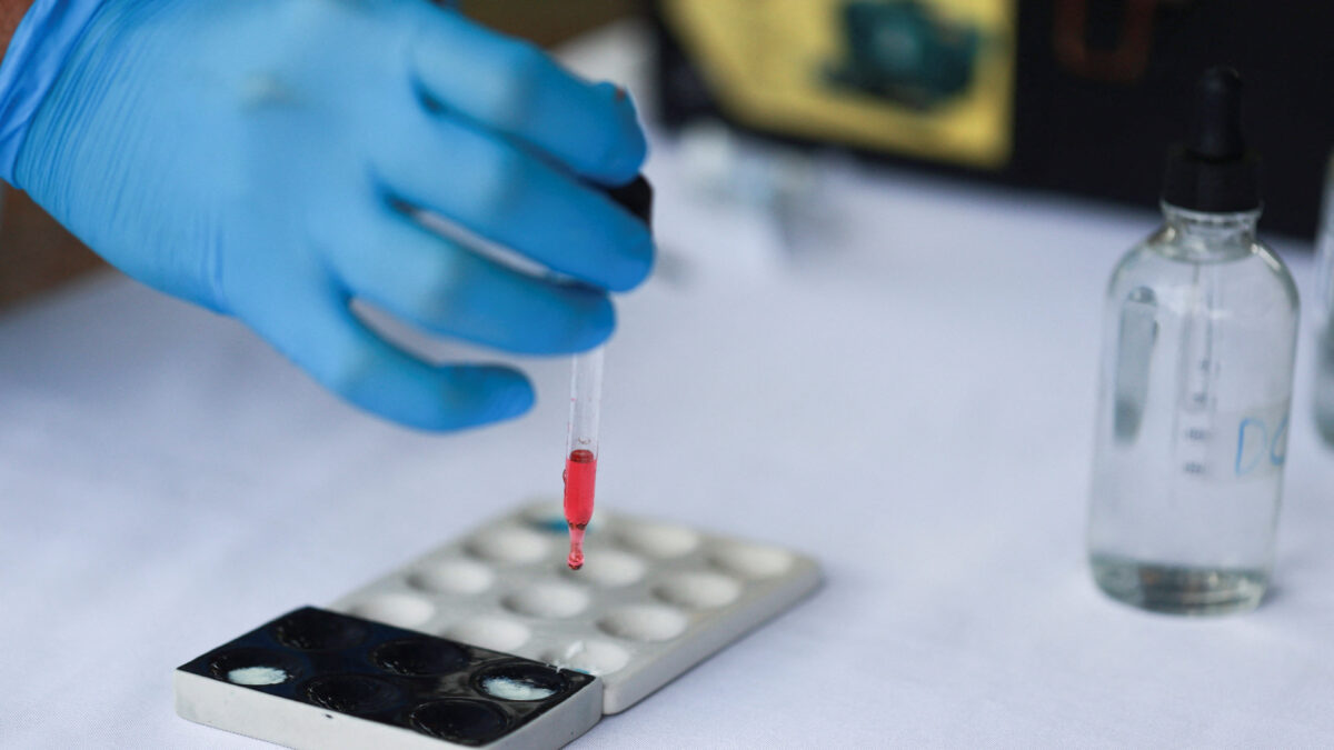 An employee from the bioanalysis unit of the National Institute of Forensic Sciences (INACIF) conducts tests to confirm that packages of seized drugs to be incinerated are narcotics, during an operation carried out by INACIF and the Attorney General’s Office, alongside the U.S. Southern Command, in Pedro Brand, Dominican Republic, February 26, 2026. REUTERS/Erika Santelices.