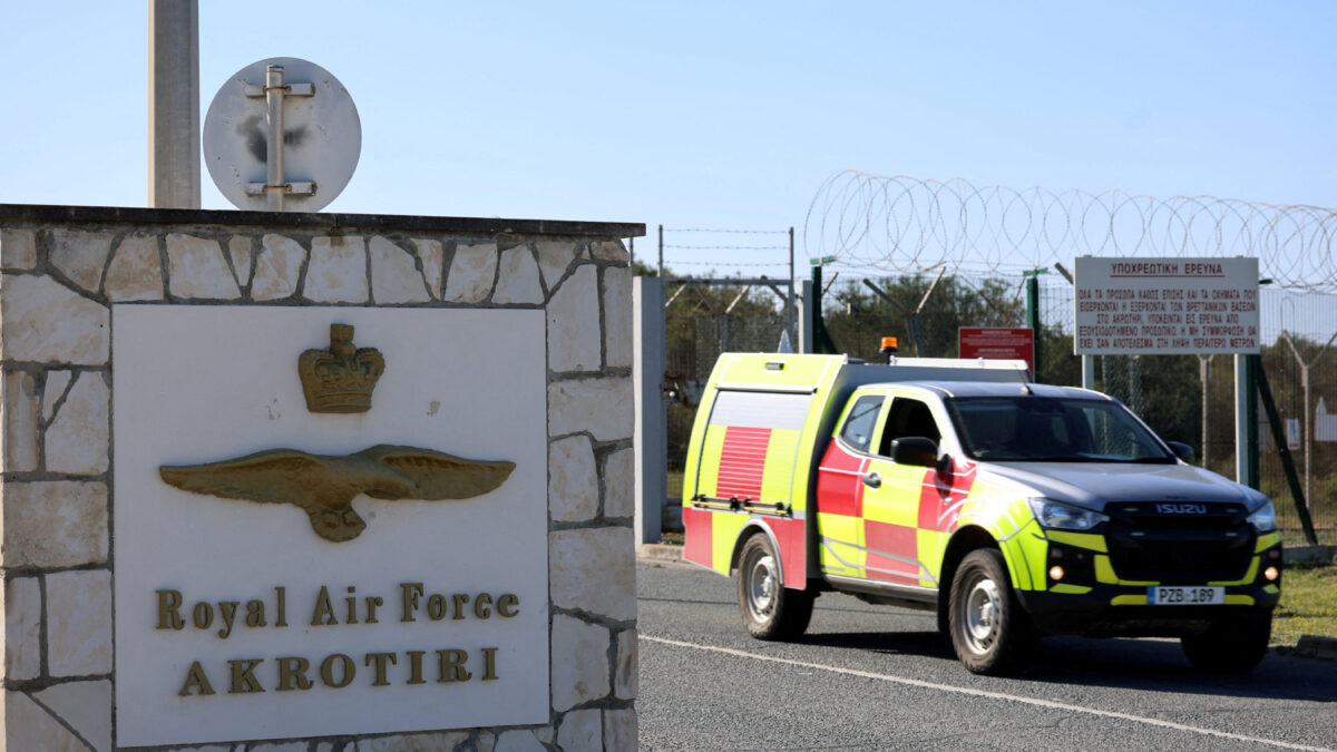 FILE PHOTO: A car drives out of the entrance of RAF Akrotiri, a British sovereign base in the country, as the conflict in the Middle East intensifies, Cyprus March 5, 2026. REUTERS/Yiannis Kourtoglou/File Photo