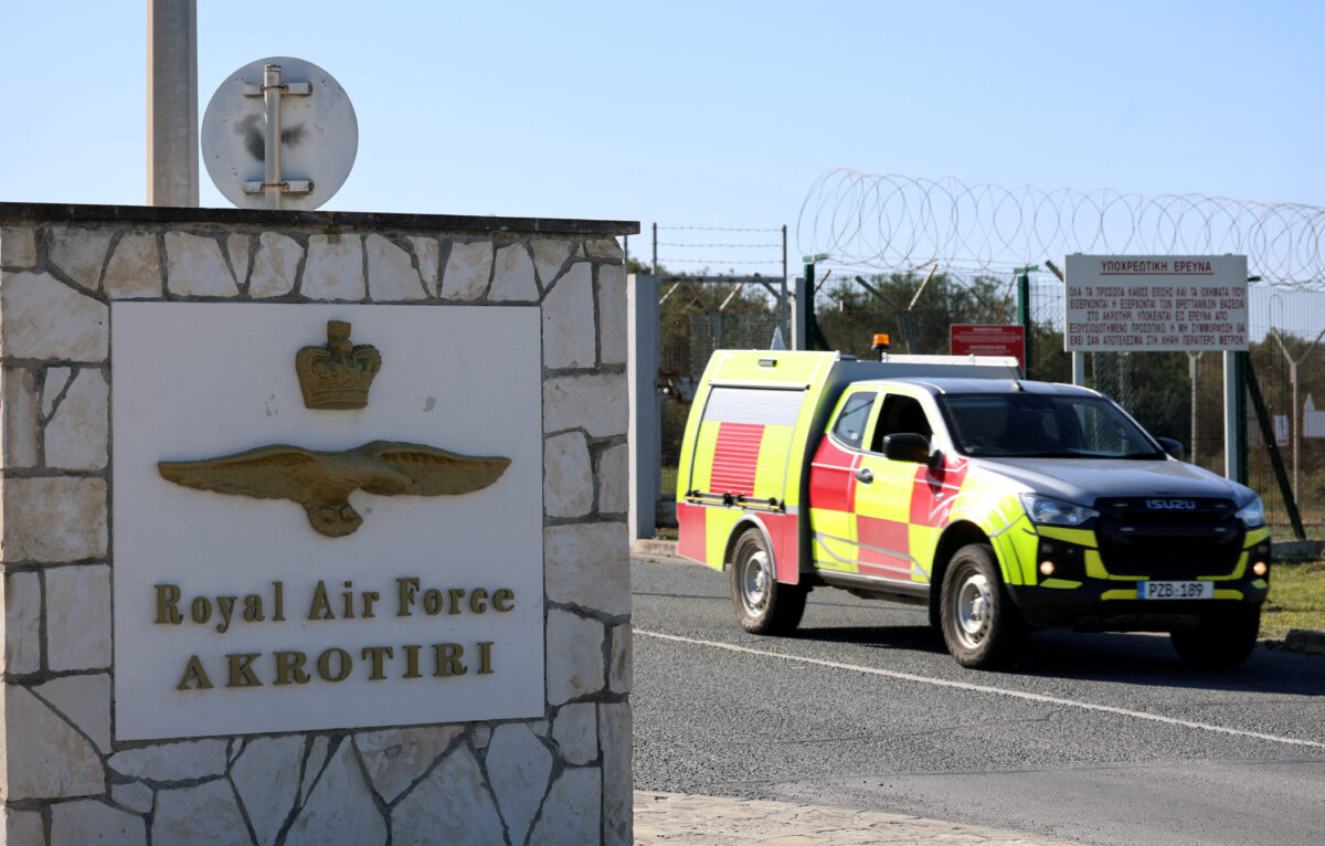 FILE PHOTO: A car drives out of the entrance of RAF Akrotiri, a British sovereign base in the country, as the conflict in the Middle East intensifies, Cyprus March 5, 2026. REUTERS/Yiannis Kourtoglou/File Photo