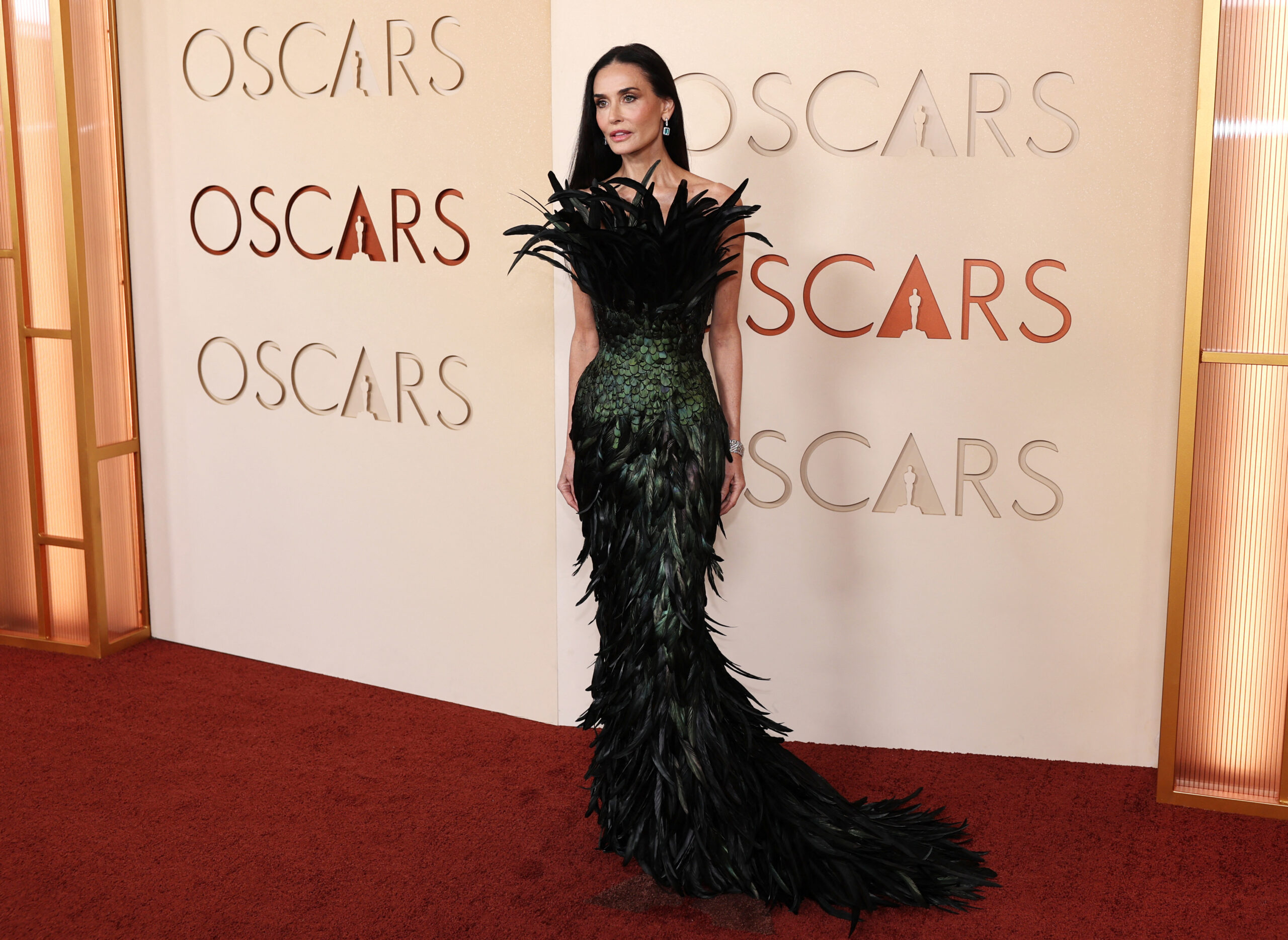 98th Academy Awards – Oscars Arrivals – Hollywood Demi Moore poses on the red carpet during the Oscars arrivals at the 98th Academy Awards in Hollywood, Los Angeles, California, U.S., March 15, 2026. REUTERS/Daniel Cole