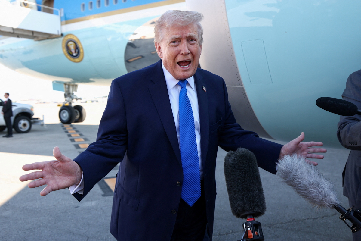 U.S. President Donald Trump speaks to the media before departing West Palm Beach aboard Air Force One, Florida, U.S., March 23, 2026.