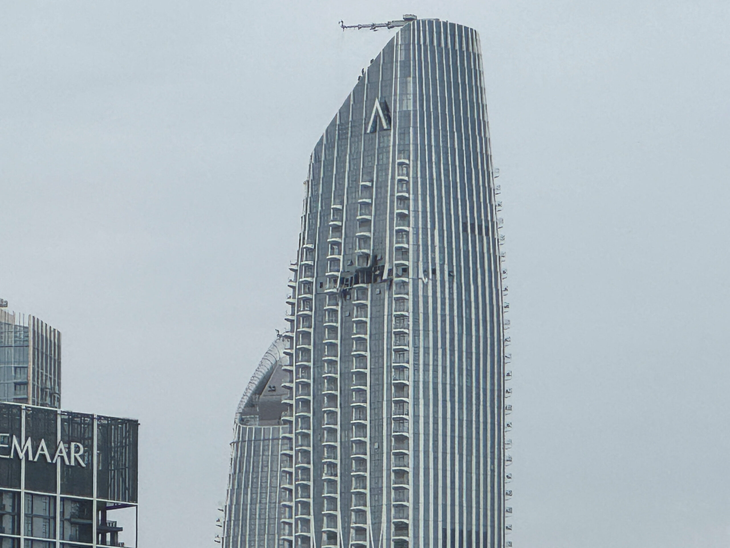 A damaged building in the vicinity of Dubai Creek Harbour after a drone fell on it, amid the U.S.-Israeli conflict with Iran, in Dubai A damaged building in the vicinity of Dubai Creek Harbour after a drone fell on it, amid the U.S.-Israeli conflict with Iran, in Dubai, United Arab Emirates, March 12, 2026. Picture taken with a mobile phone. REUTERS/Stringer
