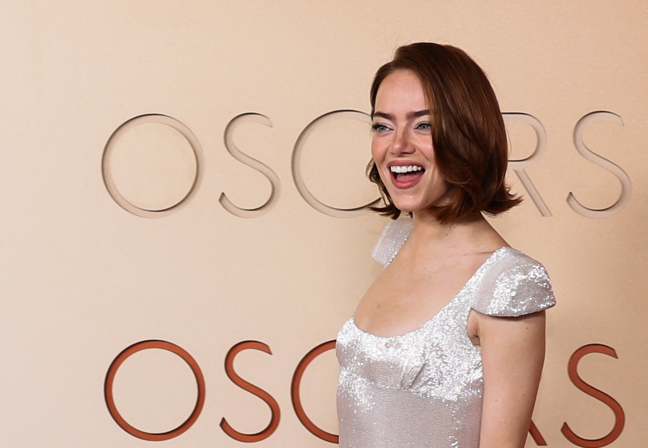 Emma Stone poses on the red carpet during the Oscars arrivals at the 98th Academy Awards in Hollywood, Los Angeles, California, U.S., March 15, 2026. REUTERS