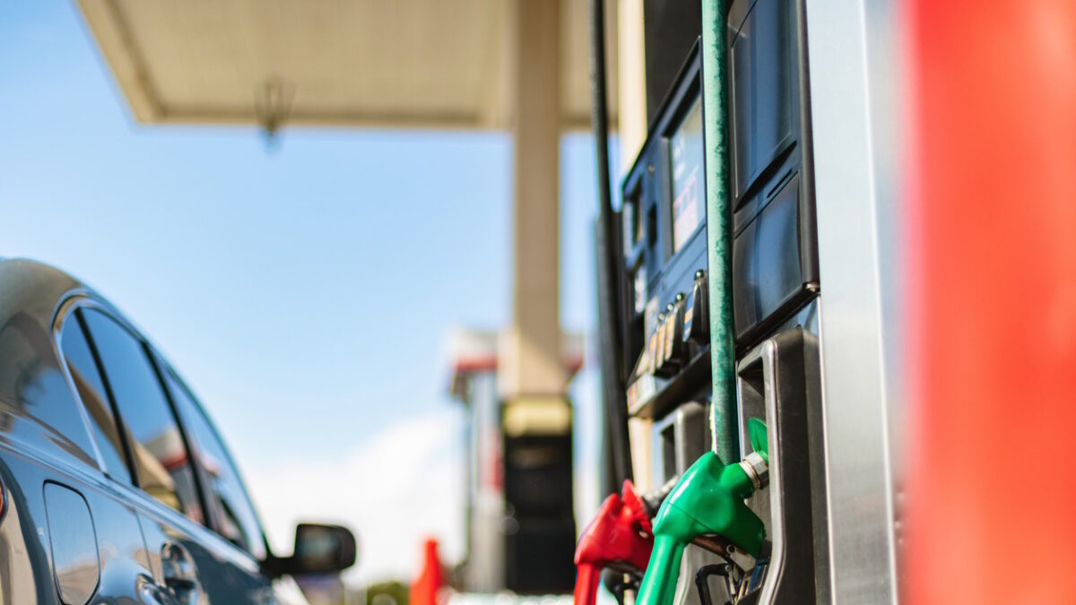 Western USA Economy and Inflation Filling Gas Tank Viewing Sales Price at The Pump Photo Series