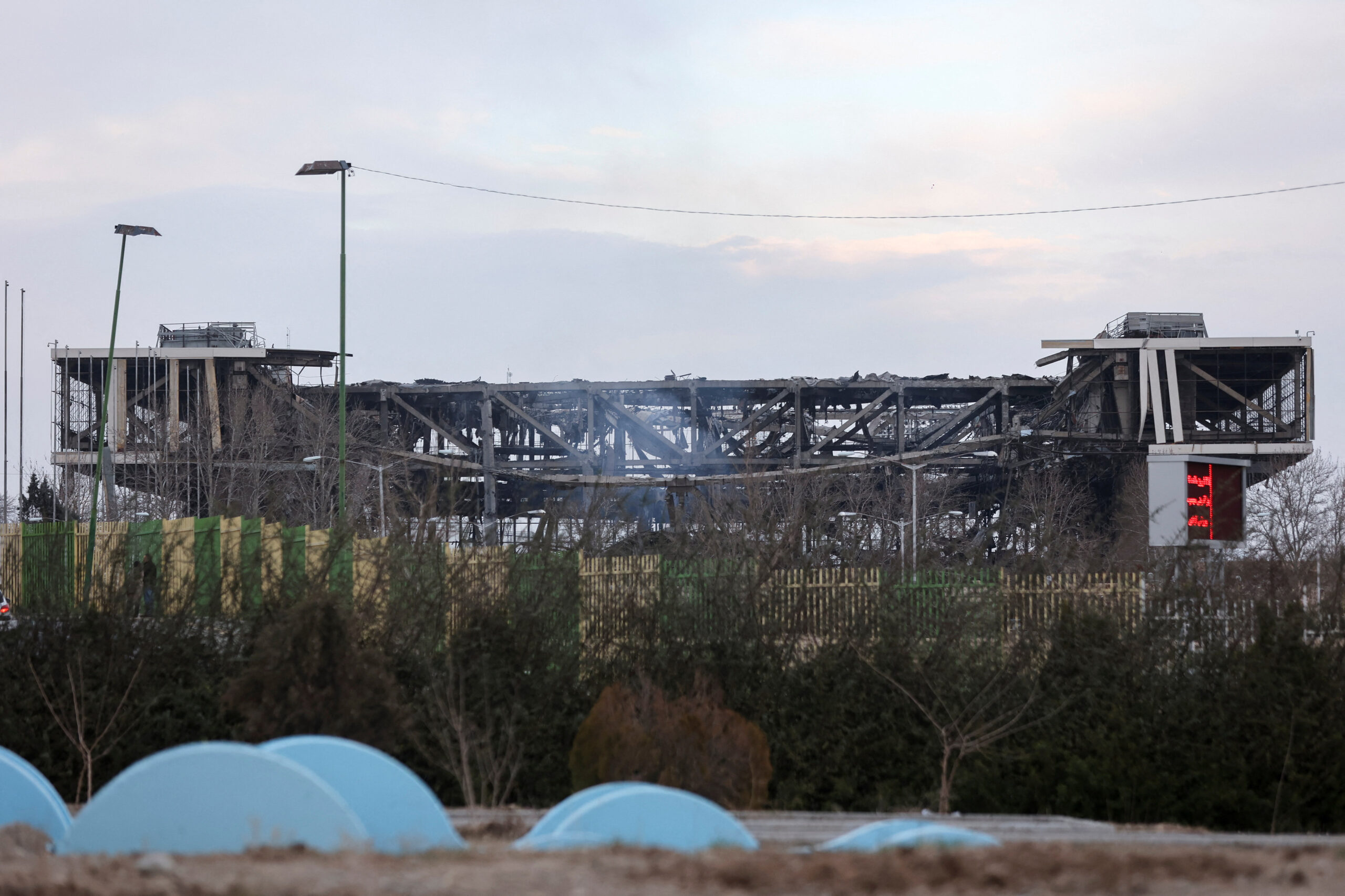 Aftermath of an attack on Azadi Stadium in Tehran Smoke rises over damaged Azadi Stadium following an attack, amid the U.S.-Israeli conflict with Iran, in Tehran, Iran, March 5, 2026. Majid Asgaripour/WANA (West Asia News Agency) via REUTERS ATTENTION EDITORS - THIS PICTURE WAS PROVIDED BY A THIRD PARTY
