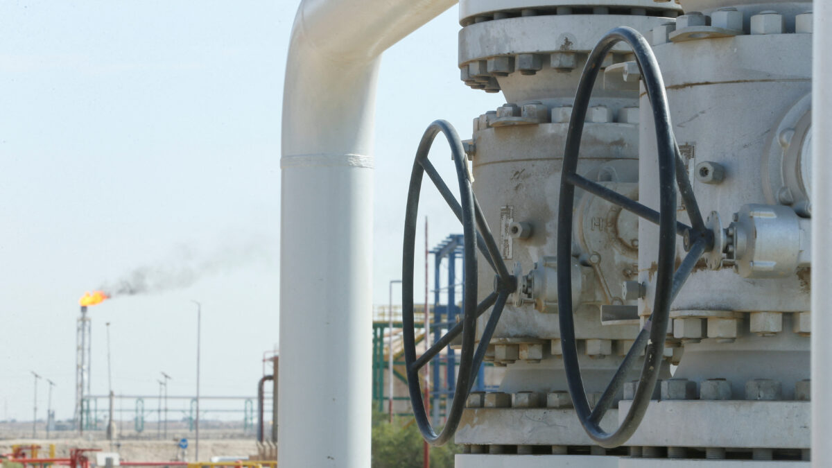 A gas flare burns in the distance at the Rumaila oil field, amid nationwide output cuts following the closure of the Strait of Hormuz, in Basra, Iraq, March 4, 2026. REUTERS/Essam Al-Sudani