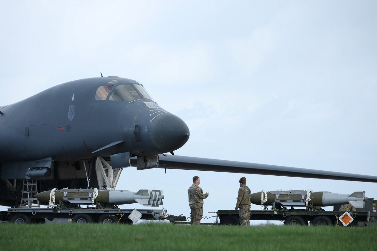RAF Fairford airbase, amid the U.S.–Israeli conflict with Iran U.S. Airforce (USAF) personnel stand near to munitions and a USAF B-1B bomber, at RAF Fairford airbase, which is used by USAF personnel, amid the U.S.–Israeli conflict with Iran, in Fairford, Gloucestershire, Britain, March 11, 2026. REUTERS/Phil Noble