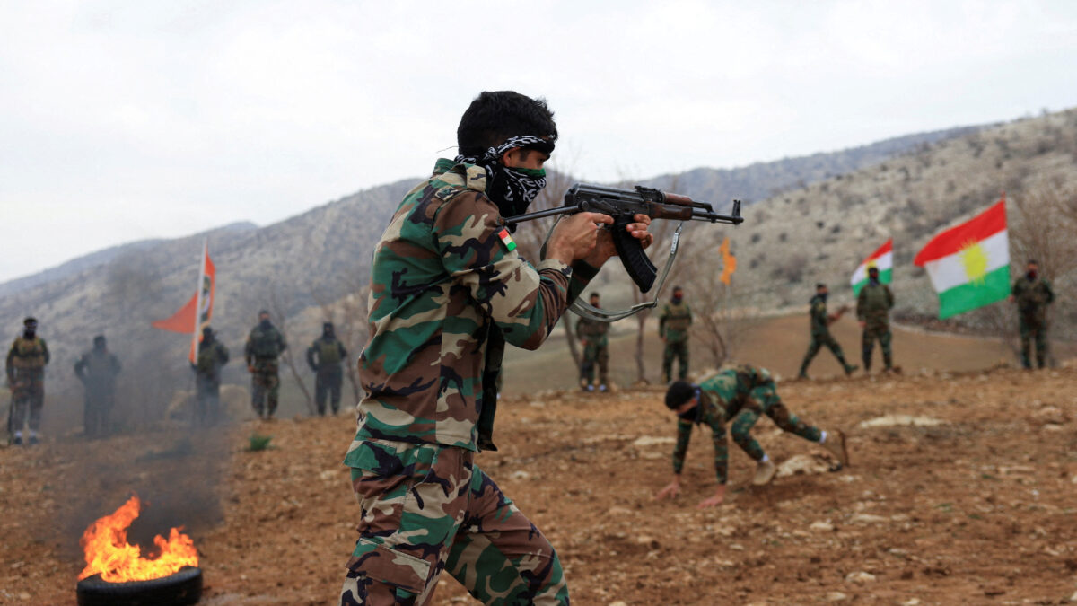 FILE PHOTO: A fighter from the Iranian Kurdistan Freedom Party (PAK) takes part in a training exercise at a base near Erbil, Iraq February 12, 2026. REUTERS/Thaier Al-Sudani/File Photo