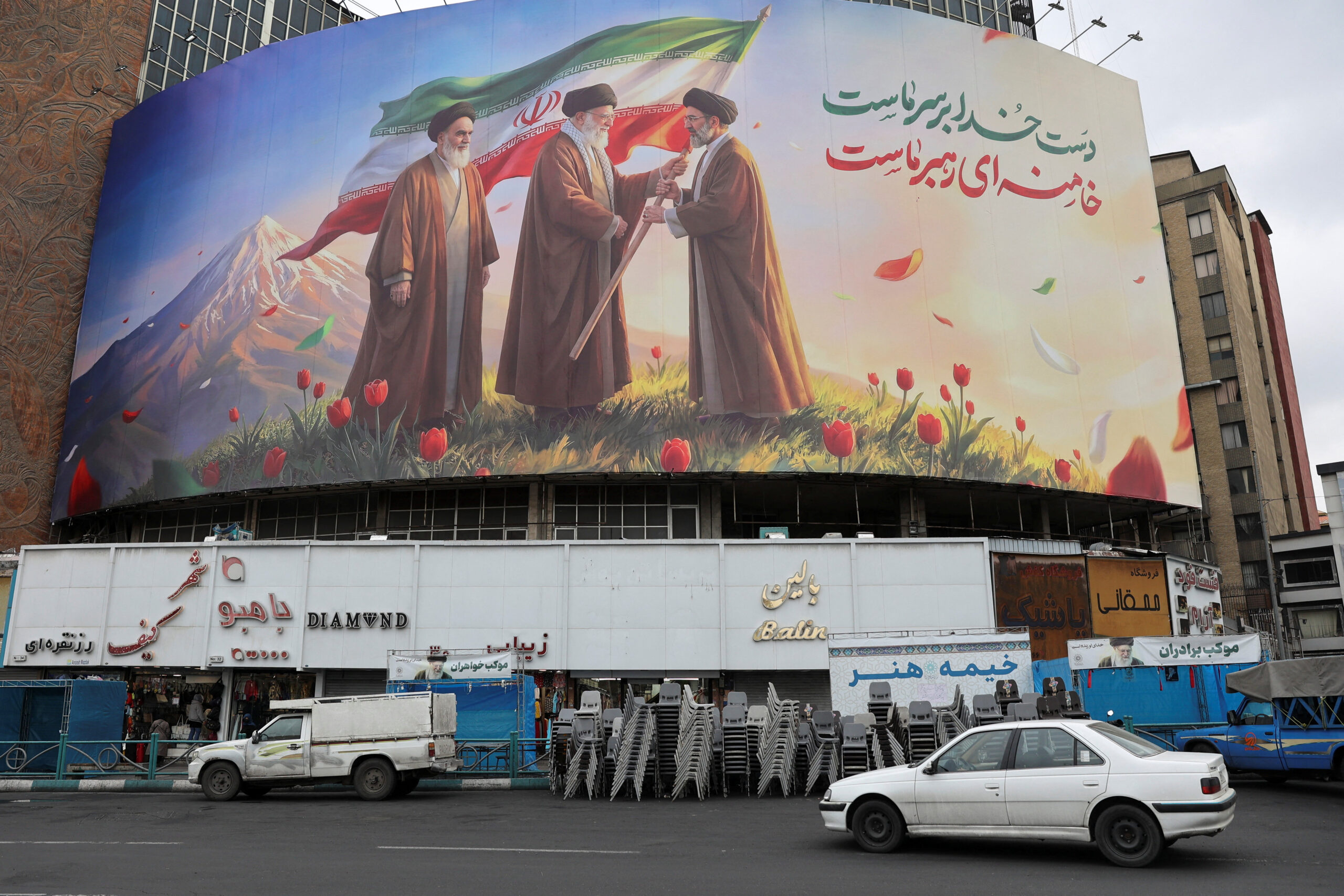 A banner of Iran’s new supreme leader Mojtaba Khamenei with late supreme leader Ayatollah Ali Khamenei, in Tehran A banner of Iran's new supreme leader Mojtaba Khamenei with late supreme leader Ayatollah Ali Khamenei and late supreme leader Ayatollah Ruhollah Khomeini on a building, amid the U.S.-Israeli conflict with Iran, in Tehran, Iran, March 10, 2026. Majid Asgaripour/WANA (West Asia News Agency) via REUTERS ATTENTION EDITORS - THIS PICTURE WAS PROVIDED BY A THIRD PARTY