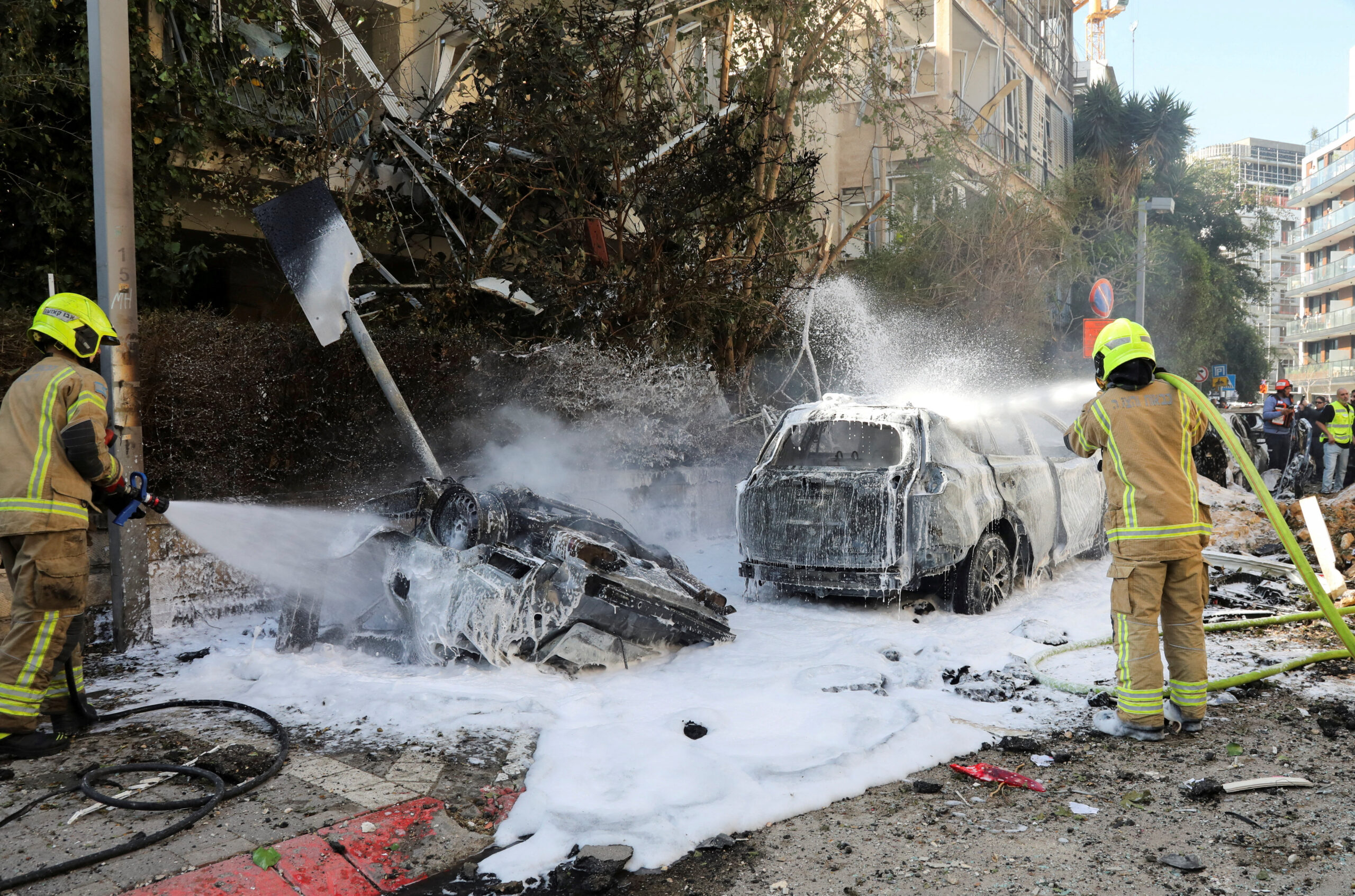 Israeli firefighters work to put out a fire following Iranian missile strikes on Israel, amid the U.S.-Israel conflict with Iran, in Tel Aviv Israeli firefighters work to put out a fire following Iranian missile strikes on Israel, amid the U.S.-Israel conflict with Iran, in Tel Aviv, Israel March 24, 2026. REUTERS/Gideon Markowicz ISRAEL OUT. NO COMMERCIAL OR EDITORIAL SALES IN ISRAEL TPX IMAGES OF THE DAY