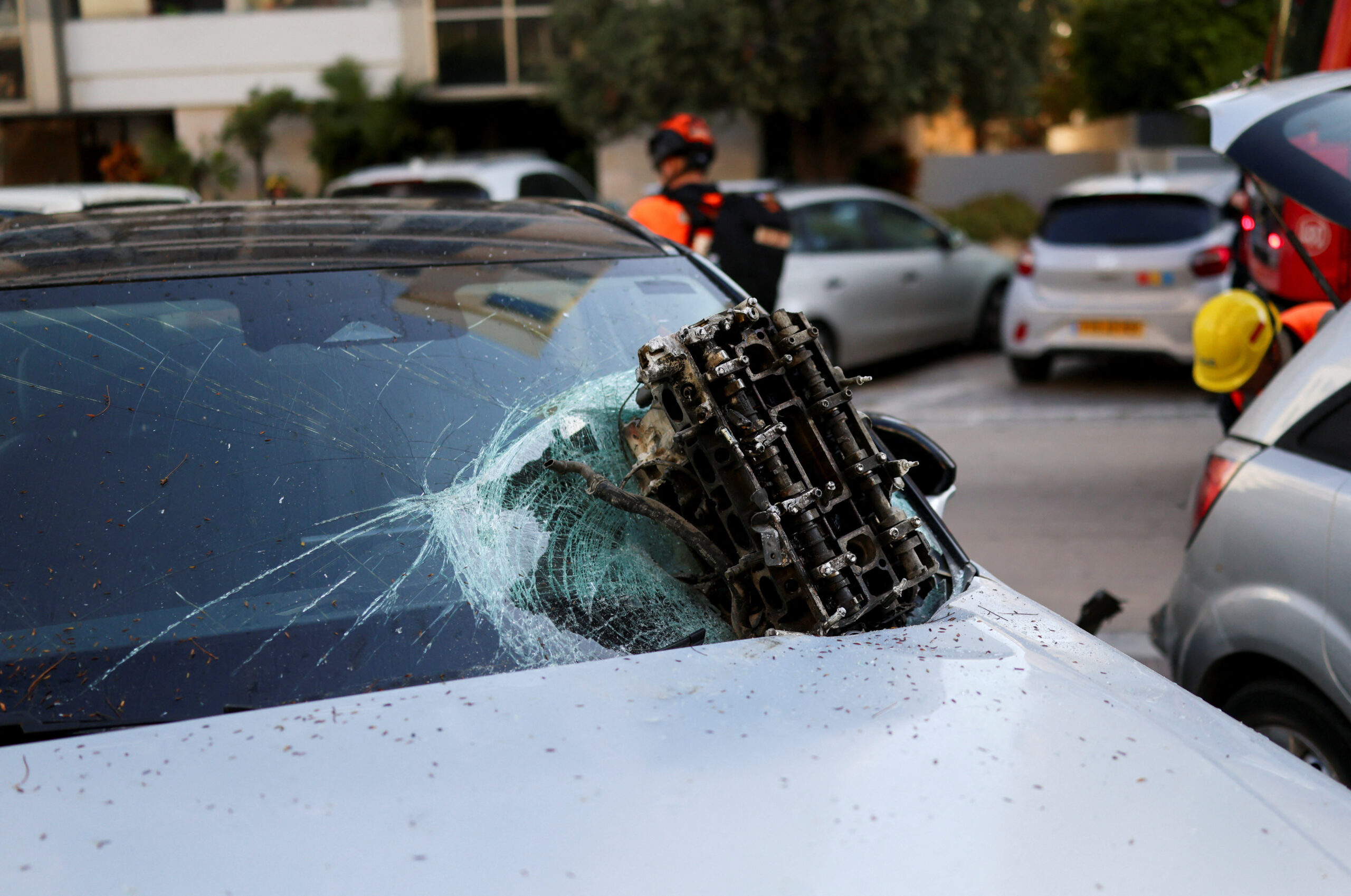 Aftermath of Iranian missile barrages in central Israel A piece of debris lies on a destroyed car at the site following Iranian missile barrages in central Israel, amid the U.S.-Israel conflict with Iran, in Tel Aviv, Israel, March 24, 2026. REUTERS/Ronen Zvulun