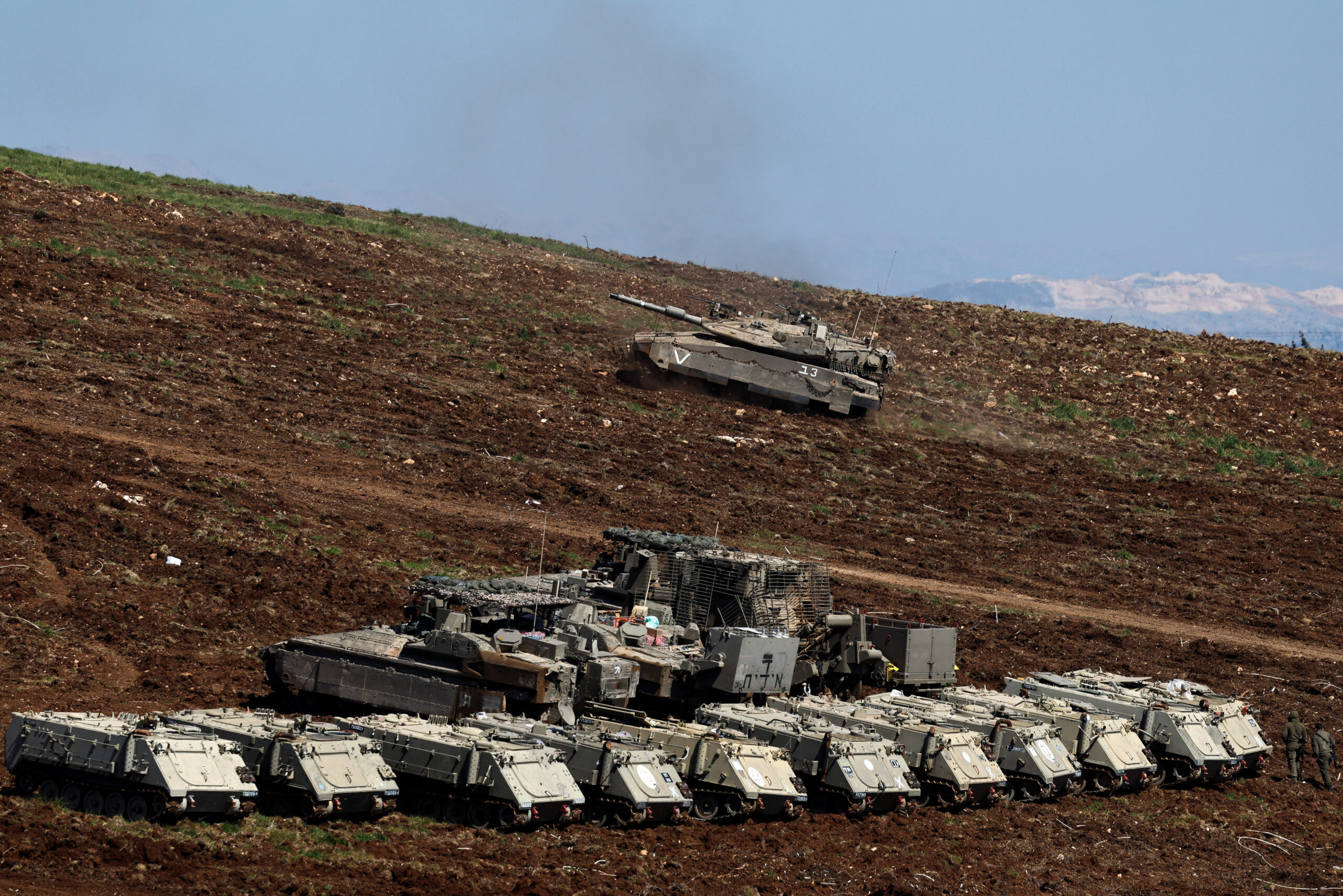 An Israeli tank maneuvers on the Israeli side of the Israel-Lebanon border An Israeli tank maneuvers, next to armoured personnel carriers (APCs), on the Israeli side of the Israel-Lebanon border, amid escalation between Hezbollah and Israel, and amid the U.S.-Israeli conflict with Iran, in northern Israel, March 10, 2026. REUTERS/Amir Cohen