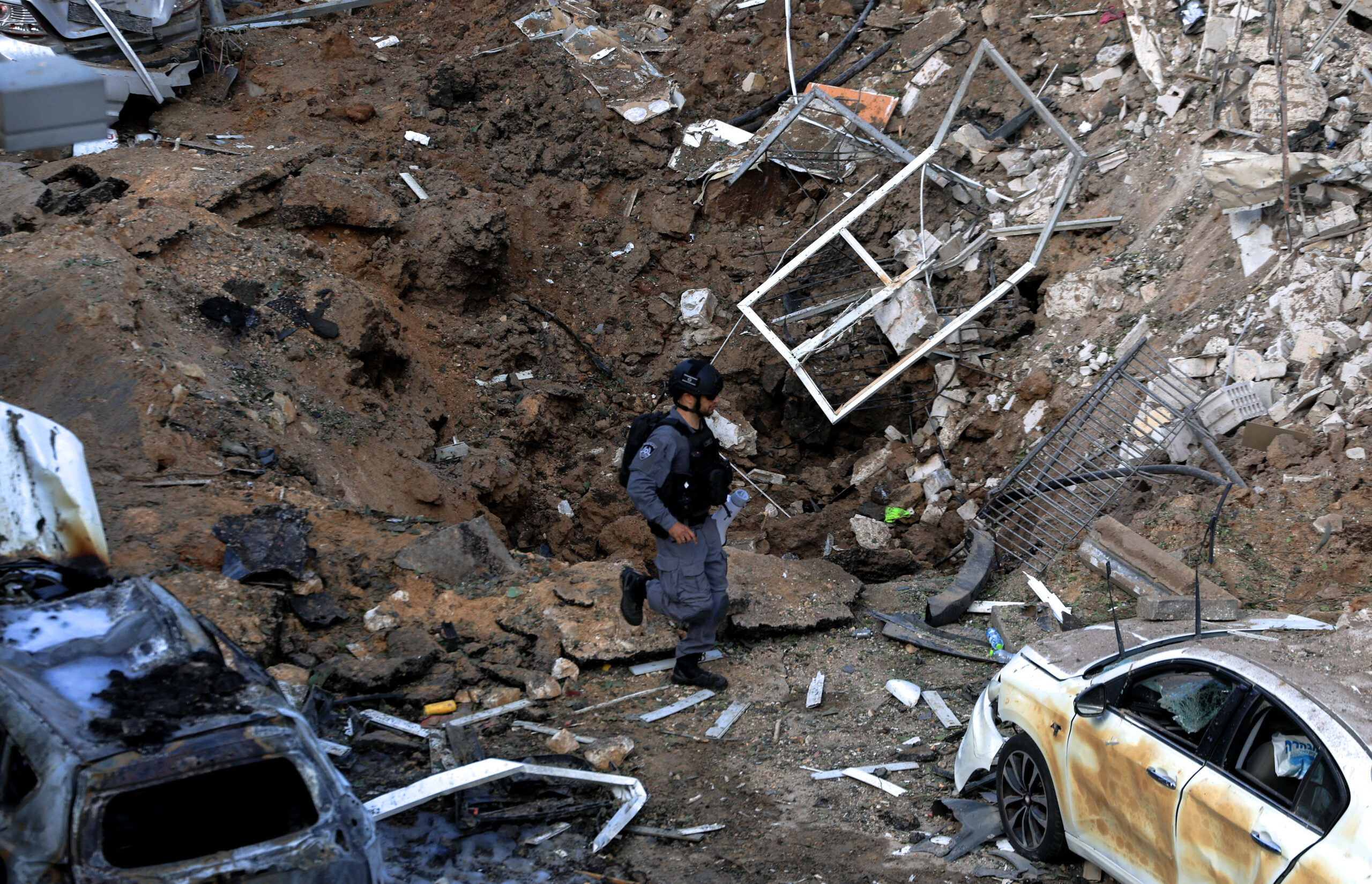 Aftermath of Iranian missile barrages in central Israel An emergency crew member works at the site following Iranian missile barrages in central Israel, amid the U.S.-Israel conflict with Iran, in Tel Aviv, Israel, March 24, 2026. REUTERS/Ronen Zvulun