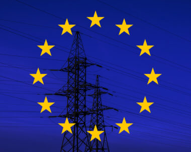 EU flag with electric tower and lines.