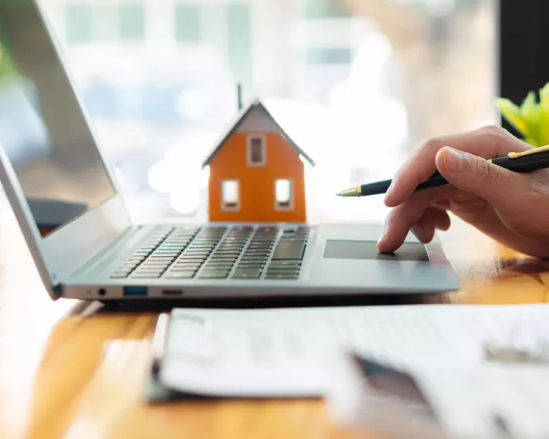 Businessman, contract signing or accountant working on financial investments. using a calculator financial documents analyze the report Real estate and home loan insurance