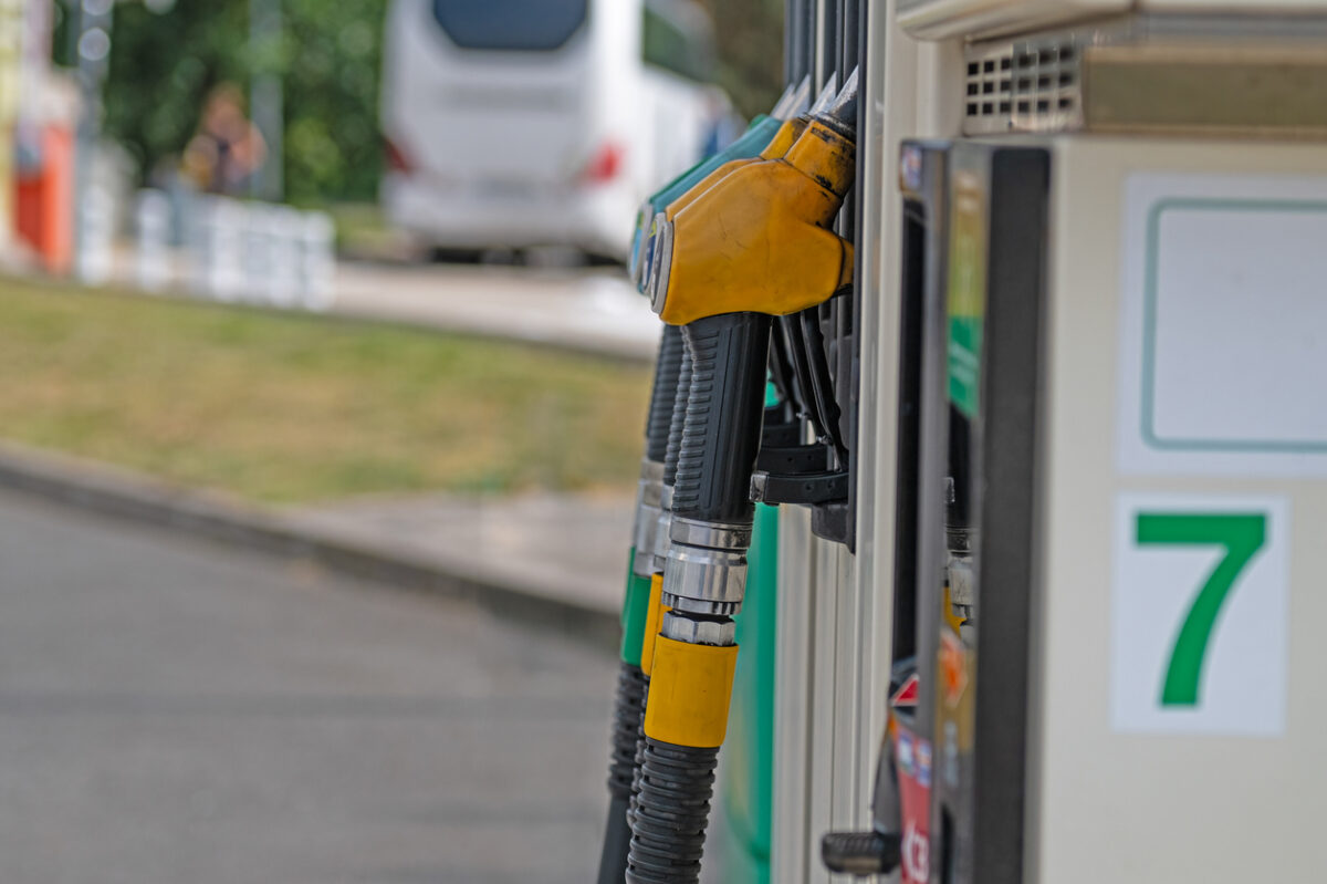 A fuel pump at a service station is ready for refueling.