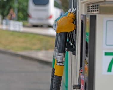 A fuel pump at a service station is ready for refueling.