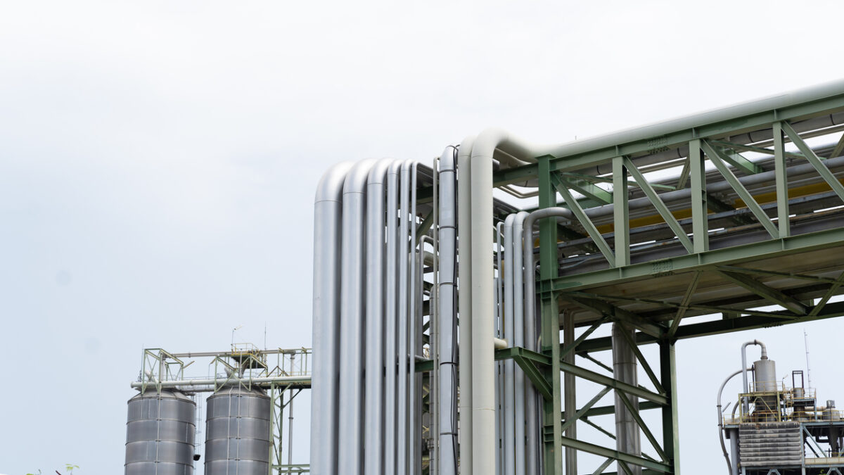 Gas interconnector. Pipeline for natural gas. Natural gas separation plant. Petroleum refinery piping network system. Network of pipes, valves, pumps, mechanisms deliver natural gas