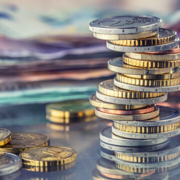 Money. Euro coins. Euro money. Euro currency.Coins stacked on each other in different positions. Money concept.