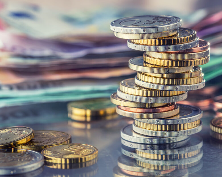 Money. Euro coins. Euro money. Euro currency.Coins stacked on each other in different positions. Money concept.