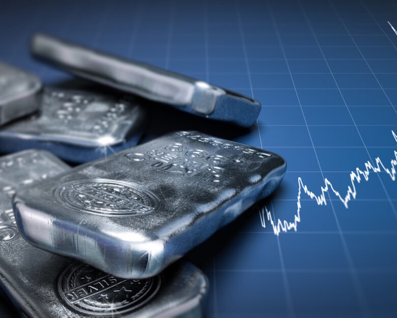 3D illustration of silver bullion bars over a blue background with growing chart. Commodities investment concept, horizontal image.