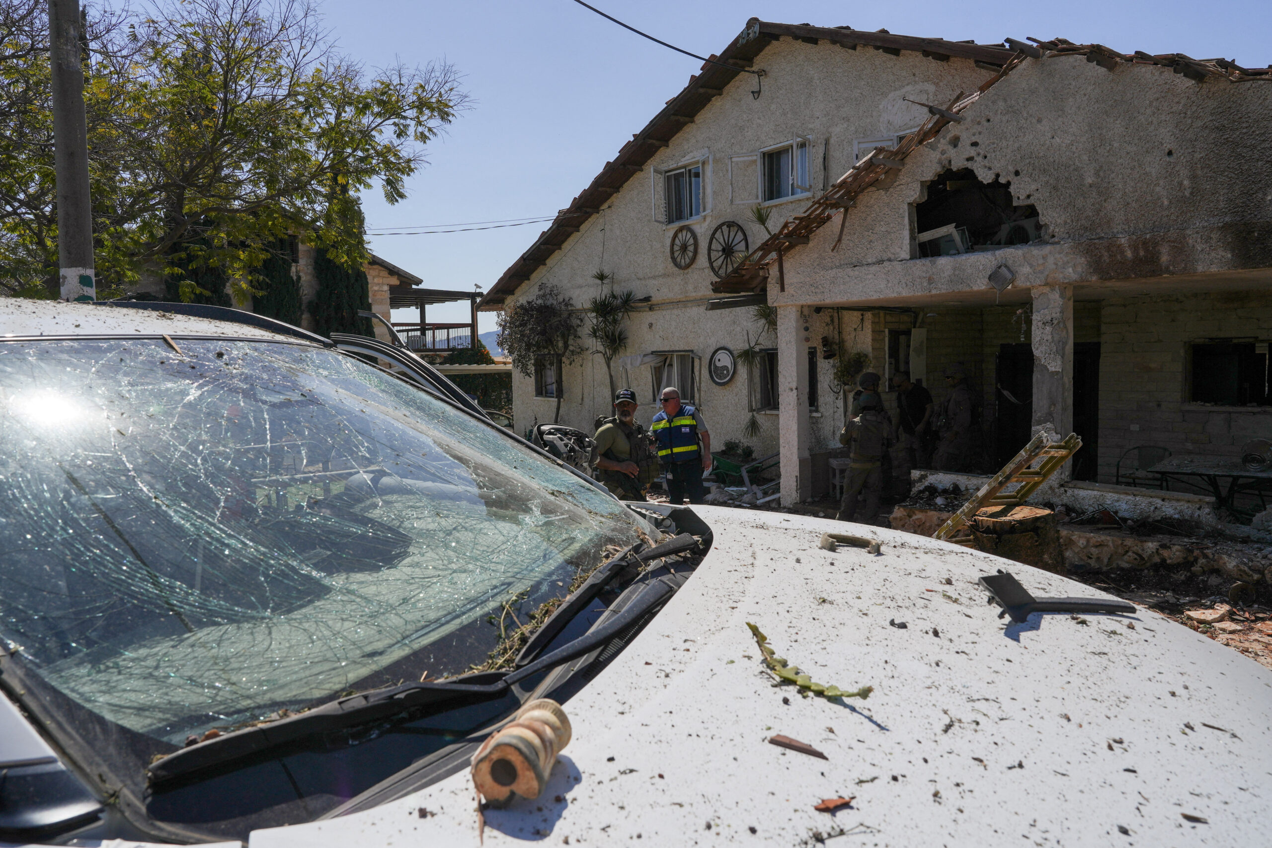 A car outside a house which were damaged by a barrage of rockets fired by Lebanon's Iran-backed Hezbollah into Israel, amid the U.S.-Israel conflict with Iran, near Israel's border with Lebanon in northern Israel, March 3, 2026. REUTERS
