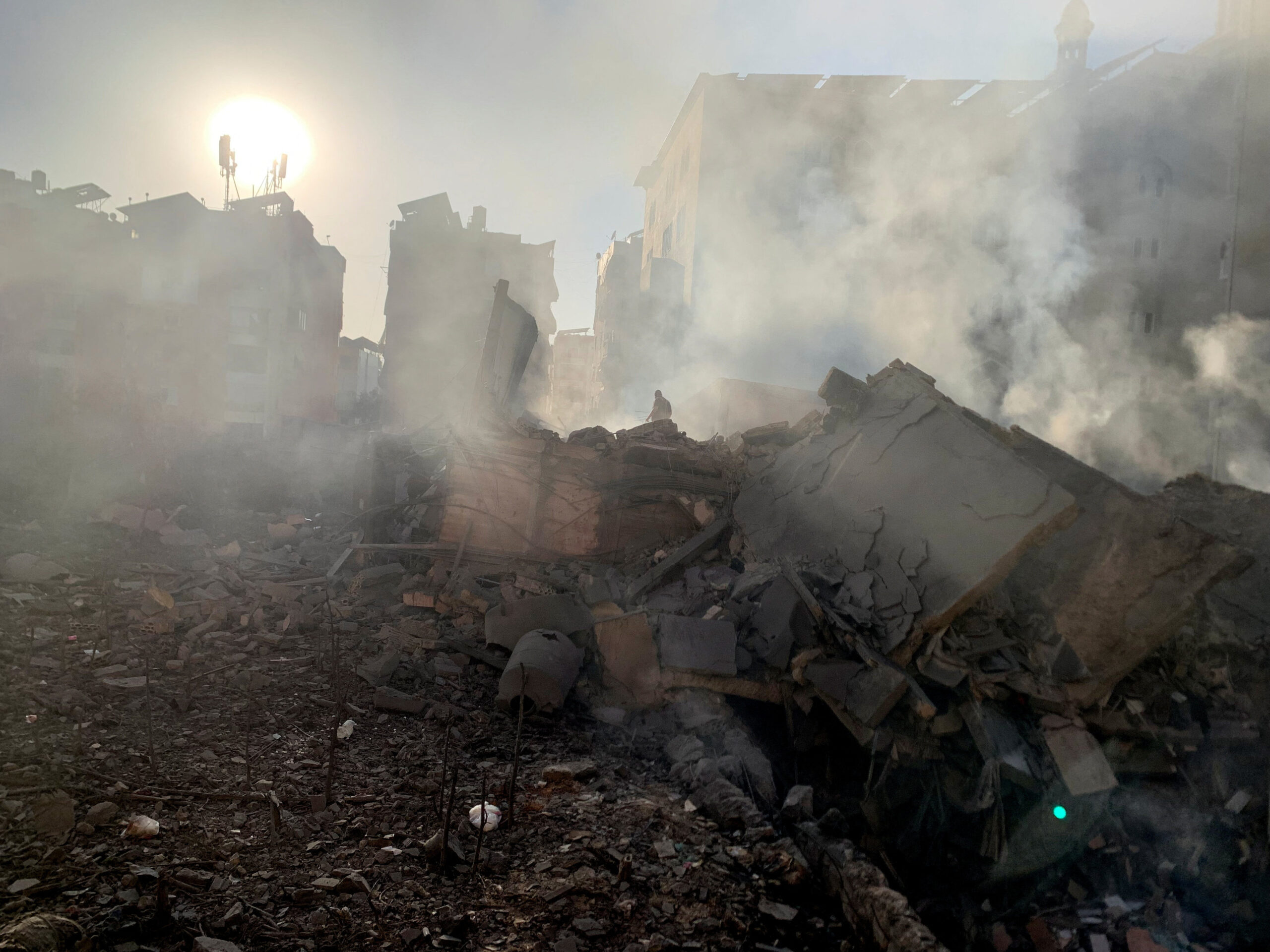 Aftermath of a strike on Beirut’s southern suburbs A member of the Lebanese Civil Defence inspects a destroyed building after a strike on Beirut's southern suburbs, following an escalation between Hezbollah and Israel, amid the U.S.-Israeli conflict with Iran, Lebanon, March 11, 2026. Picture taken with a mobile phone. REUTERS/Stringer