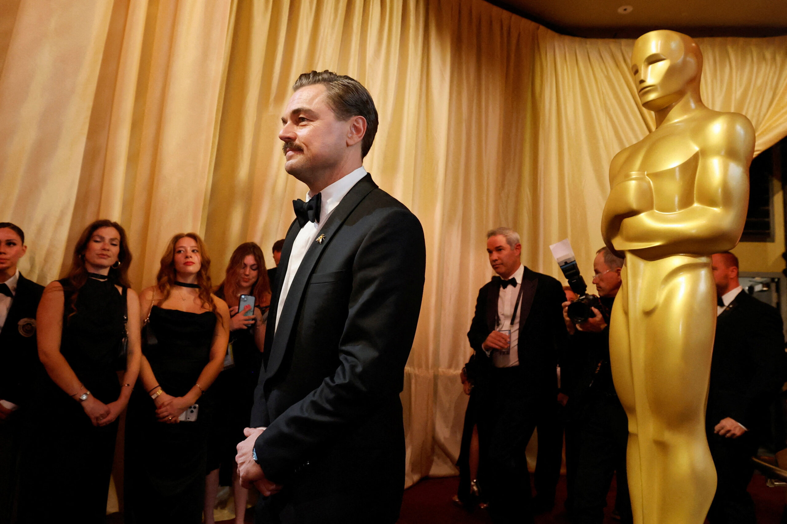 Leonardo DiCaprio poses on the red carpet during the Oscars arrivals at the 98th Academy Awards in Hollywood, Los Angeles, California, U.S., March 15, 2026.    REUTERS