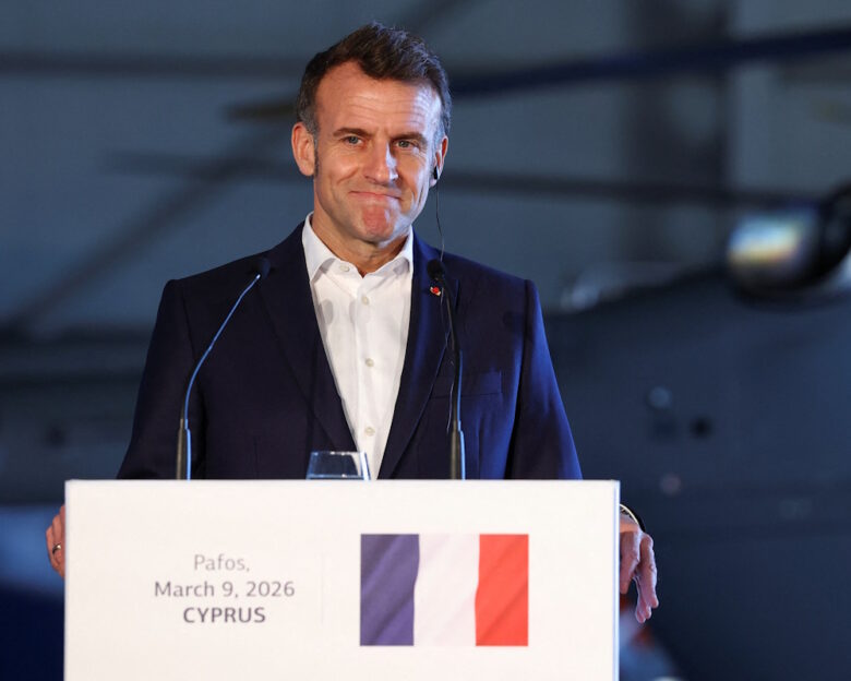 French President Emmanuel Macron looks on during a joint press conferance with Cypriot President Nikos Christodoulides (not pictured) and Greek Prime Minister Kyriakos Mitsotakis (not pictured) at Paphos military airport, on the day of Macron's visit to show France's solidarity after recent drone attacks amid the U.S.-Israeli conflict with Iran, and aimed at reinforcing European security in the Eastern Mediterranean, in Paphos, Cyprus March 9, 2026.
