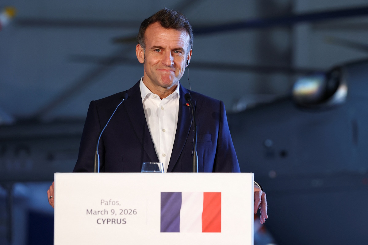 French President Emmanuel Macron looks on during a joint press conferance with Cypriot President Nikos Christodoulides (not pictured) and Greek Prime Minister Kyriakos Mitsotakis (not pictured) at Paphos military airport, on the day of Macron's visit to show France's solidarity after recent drone attacks amid the U.S.-Israeli conflict with Iran, and aimed at reinforcing European security in the Eastern Mediterranean, in Paphos, Cyprus March 9, 2026.