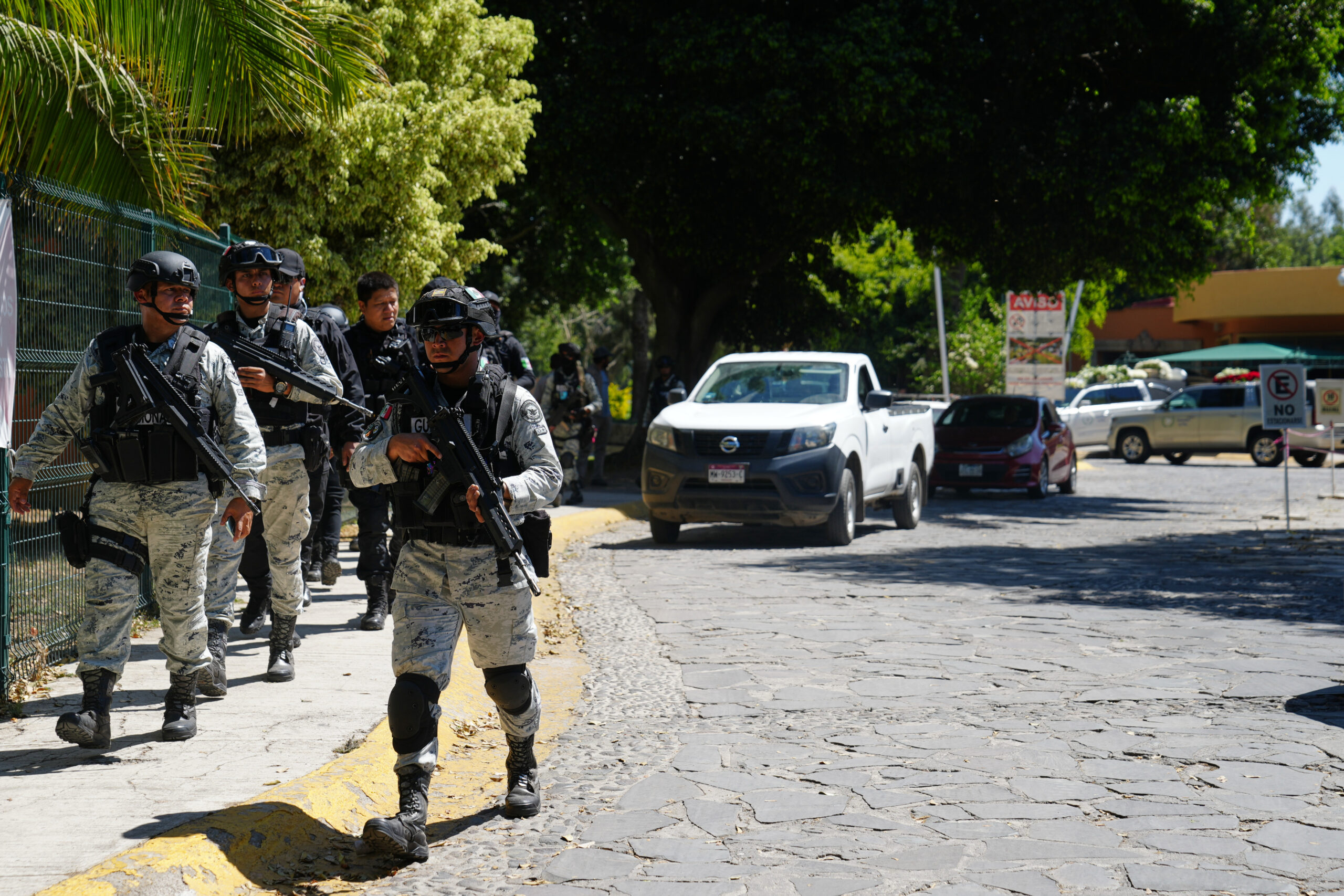Mexican National Guards patrol outside Recinto de Paz cemetery in Guadalajara, Mexico, Monday, March 2, 2026. (AP Photo/Refugio Ruiz)