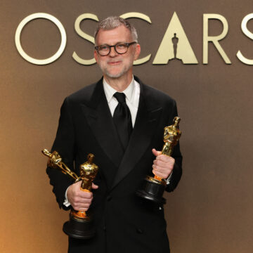 Paul Thomas Anderson poses with the Oscars he and his film "One Battle After Another" won, in the Oscars photo room at the 98th Academy Awards in Hollywood, Los Angeles, California, U.S., March 15, 2026. REUTERS/Mario Anzuoni