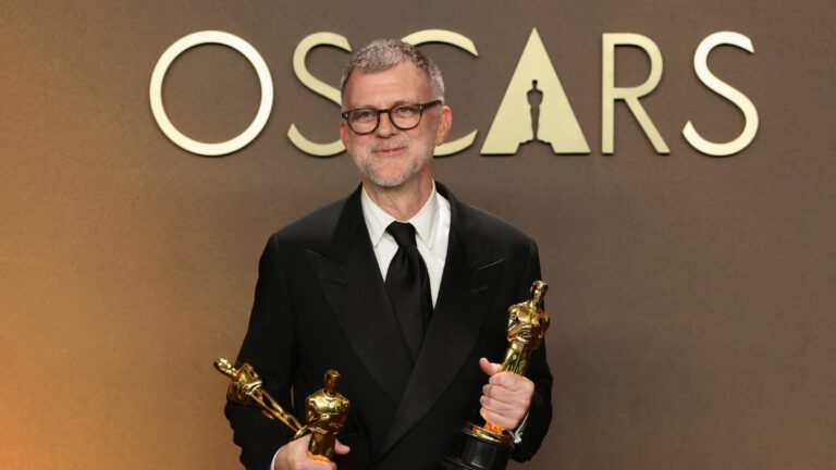 Paul Thomas Anderson poses with the Oscars he and his film "One Battle After Another" won, in the Oscars photo room at the 98th Academy Awards in Hollywood, Los Angeles, California, U.S., March 15, 2026. REUTERS/Mario Anzuoni