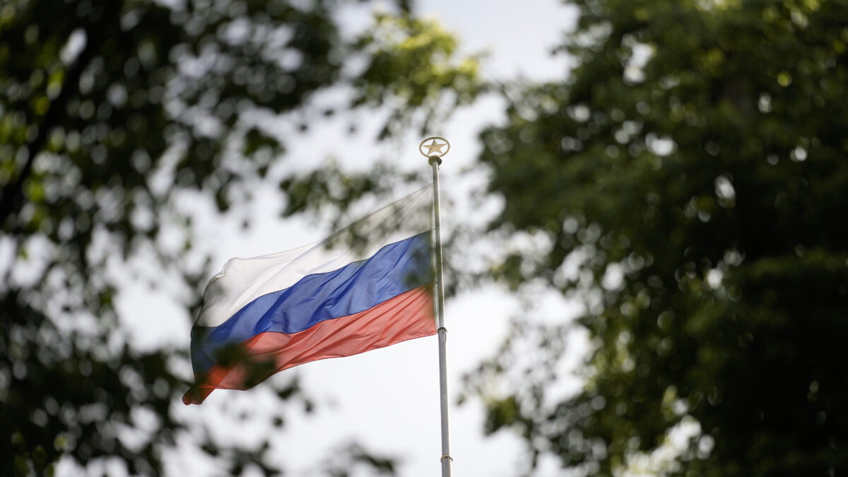 The Russian flag waves on the top of the Russian embassy in Berlin, Germany, Wednesday, May 31, 2023. Germany authorities says it has told Russia to close four out of five consulates in Germany in a tit-for-tat move after Moscow set a limit for the number of German embassy staff and related bodies that can operate in Russia. (AP Photo/Markus Schreiber)