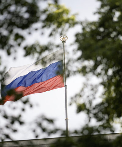 The Russian flag waves on the top of the Russian embassy in Berlin, Germany, Wednesday, May 31, 2023. Germany authorities says it has told Russia to close four out of five consulates in Germany in a tit-for-tat move after Moscow set a limit for the number of German embassy staff and related bodies that can operate in Russia. (AP Photo/Markus Schreiber)