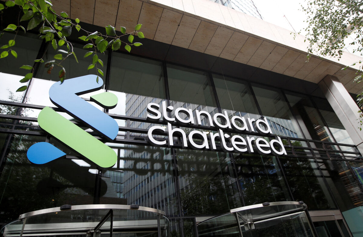 FILE PHOTO: The Standard Chartered bank logo is seen at their headquarters in London, Britain, July 26, 2022. REUTERS/Peter Nicholls/File Photo