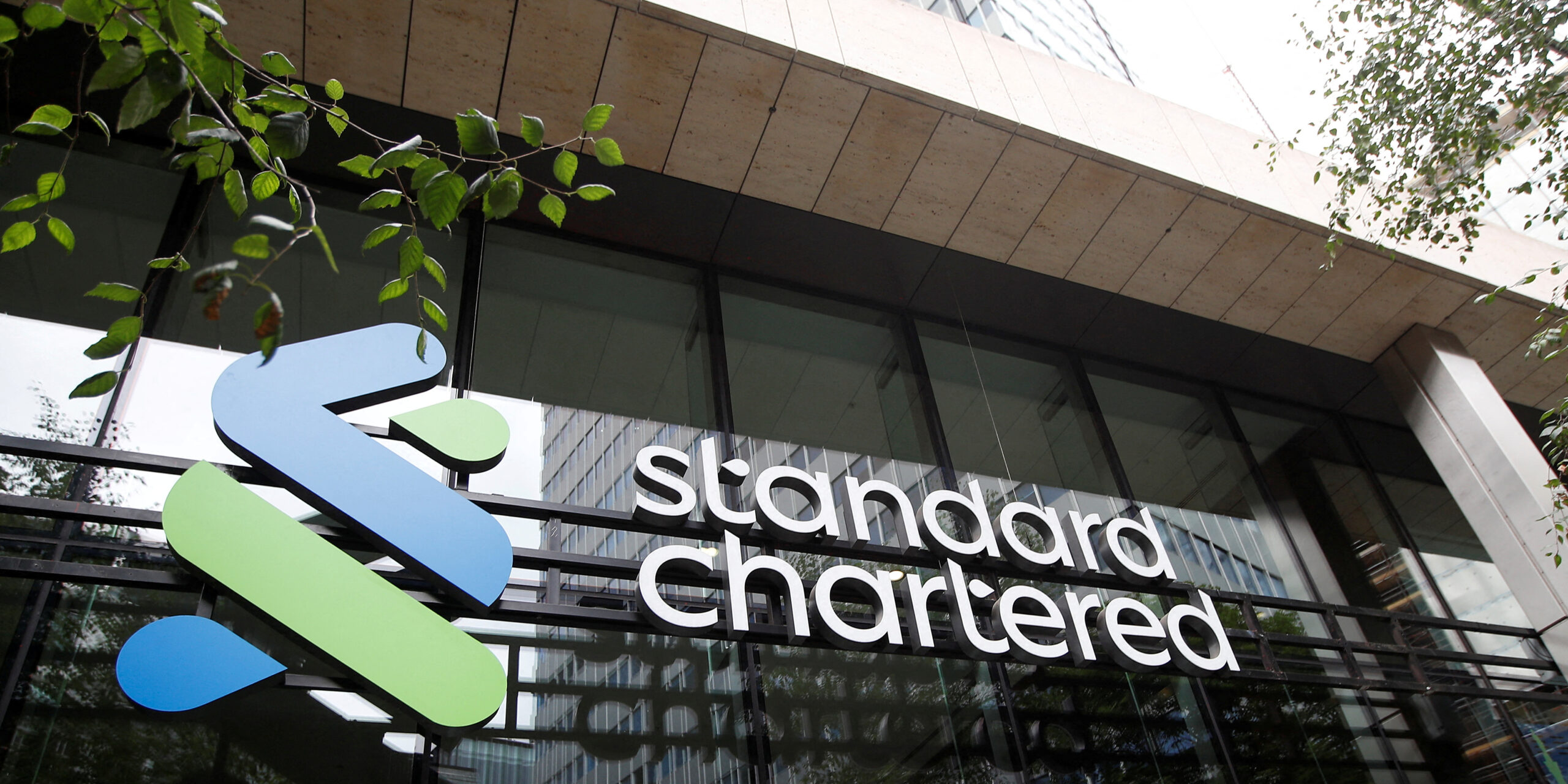 FILE PHOTO: The Standard Chartered bank logo is seen at their headquarters in London, Britain, July 26, 2022. REUTERS/Peter Nicholls/File Photo