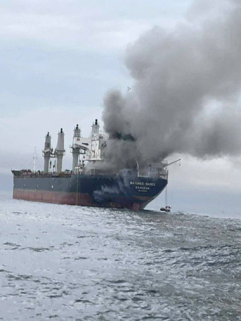 The Thailand-flagged cargo ship Mayuree Naree engulfed in black smoke in the Strait of Hormuz, March 11, 2026. ROYAL THAI NAVY