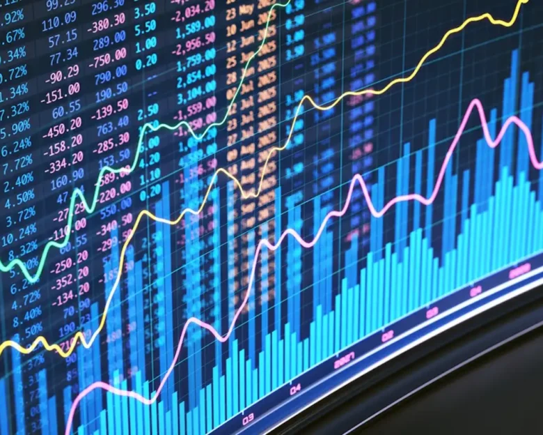 Futuristic display screen with a bar graph and colorful spreadsheet financial data