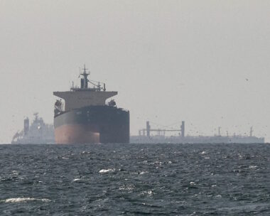 Tankers sail in the Gulf, near the Strait of Hormuz, as seen from northern Ras al-Khaimah, near the border with Oman’s Musandam governance, amid the U.S.-Israeli conflict with Iran, in United Arab Emirates, March 11, 2026