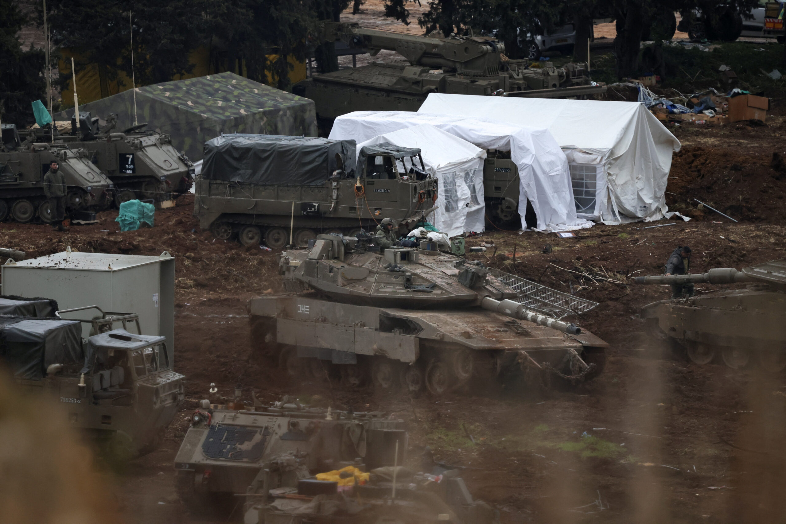 Escalation between Hezbollah and Israel, and amid the U.S.-Israeli conflict with Iran, in northern Israel Israeli soldiers and military vehicles on the Israeli side of the Israel-Lebanon border, amid escalation between Hezbollah and Israel, and amid the U.S.-Israeli conflict with Iran, in northern Israel, March 15, 2026. REUTERS/Shir Torem