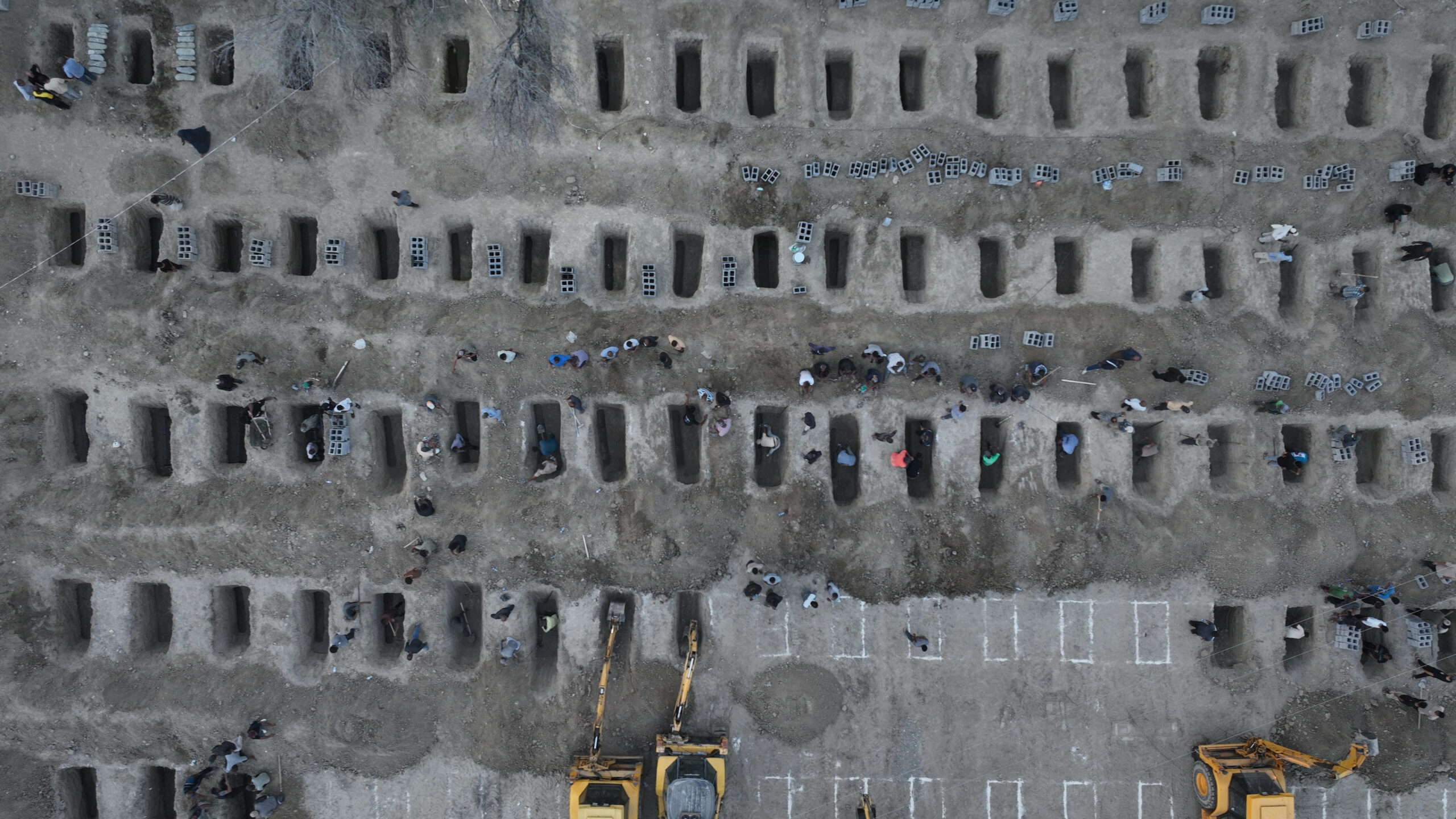 Graves are being prepared for the victims following an Israeli strike on a school in Minab Graves are being prepared for the victims following an Israeli strike on a school in Minab, Iran, March 2, 2026. Iranian Foreign Media Department/WANA (West Asia News Agency)/Handout via REUTERS ATTENTION EDITORS - THIS PICTURE WAS PROVIDED BY A THIRD PARTY.